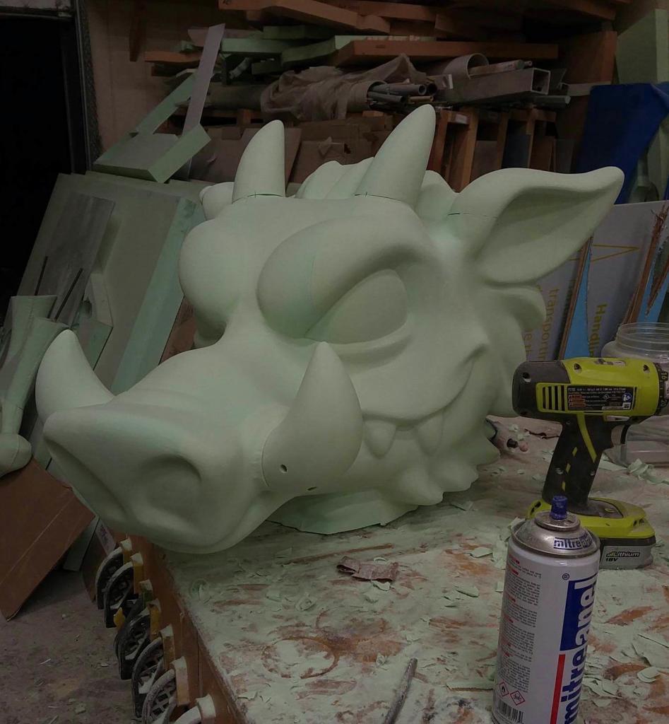 Green Foam Dragon Head On A Table. Created By A Techno CNC Router